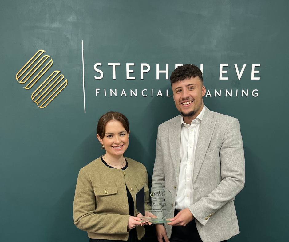 danielle slater stands on the left and rav jackson on the right, they hold the wealth and finance 2024 award between them