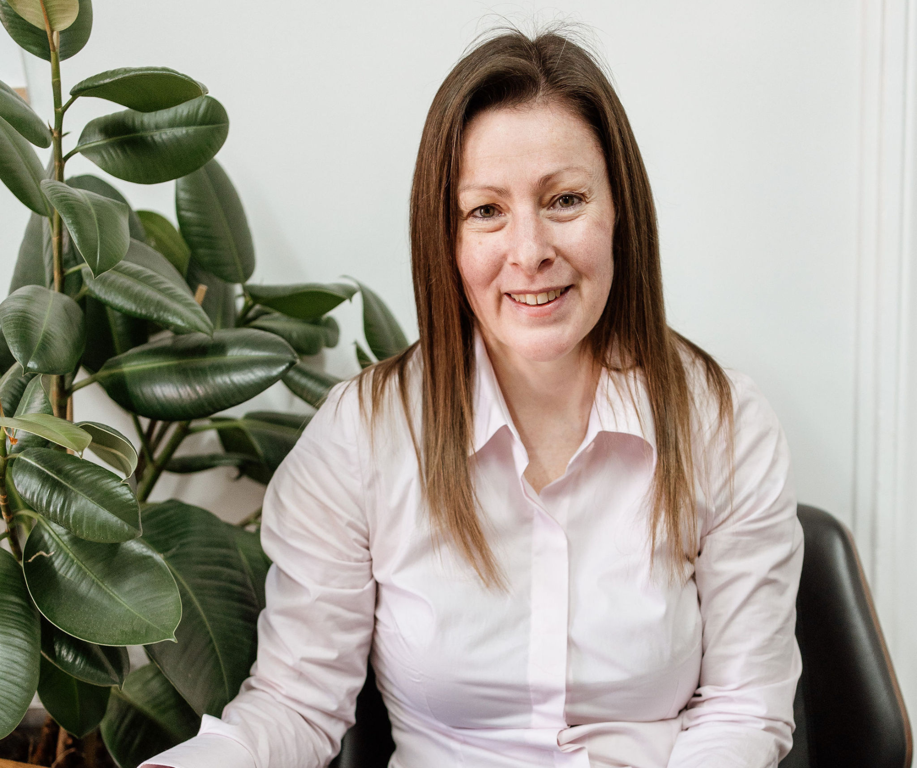 headshot of sally jackson who is smiling at the camera